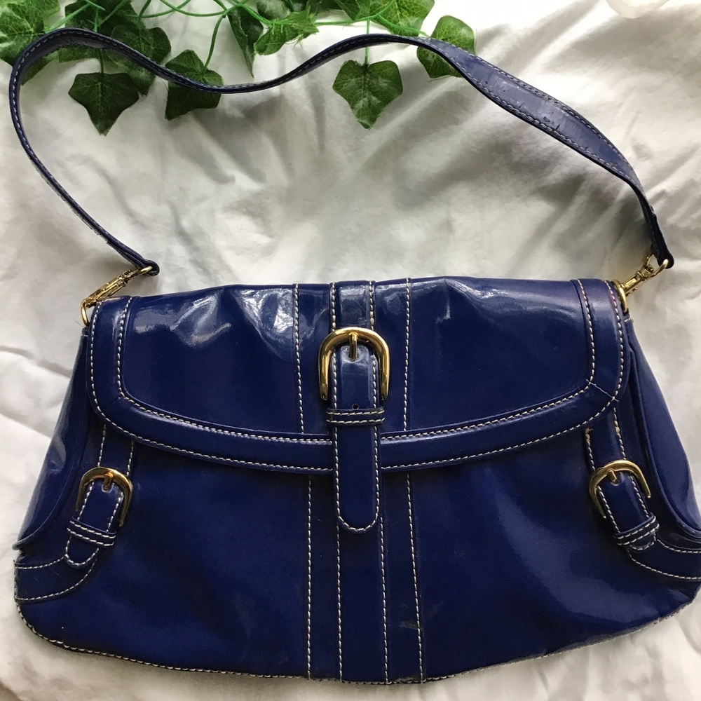 Blue shoulder bag with cheetah print interior